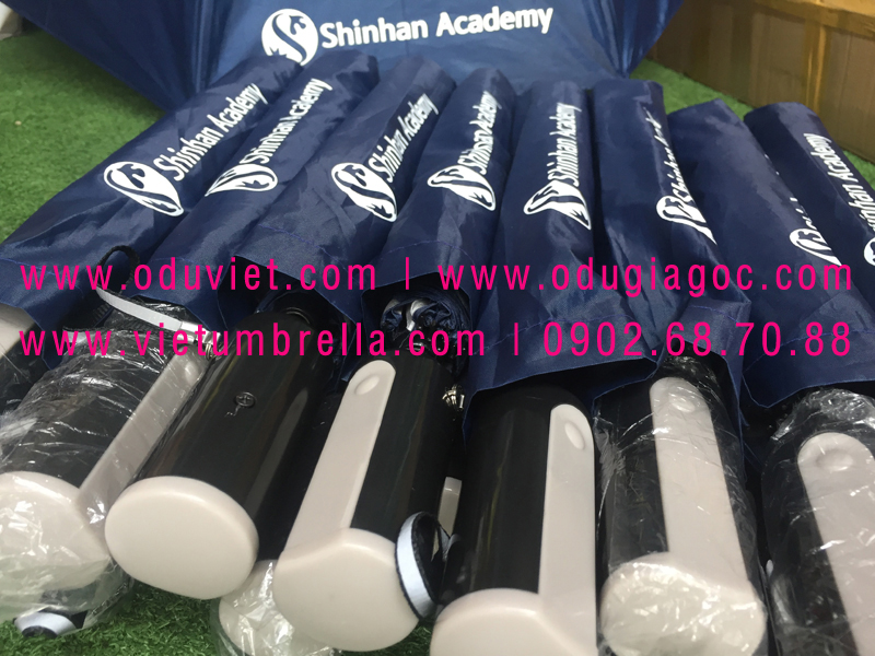 xưởng sản xuất ô dù cầm tay in logo quảng cáo